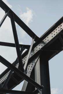 black metal frame under blue sky during daytime by Joshua Tsu courtesy of Unsplash.