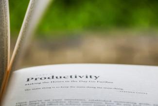 selective focus photography of Productivity printed book by kris courtesy of Unsplash.