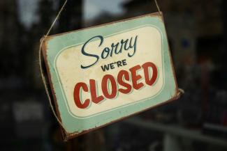 sorry we're closed signage by Tim Mossholder courtesy of Unsplash.
