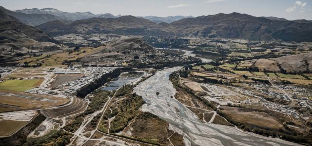 aerial photography of roadway and mountains by Tyler Lastovich courtesy of Unsplash.