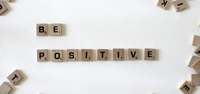 be positive scrabble pieces by Amanda Jones courtesy of Unsplash.